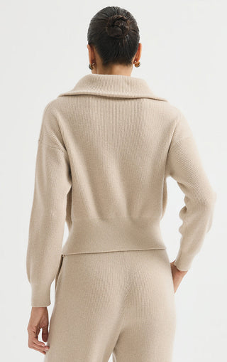 Camel wool-cashmere ribbed zip cardigan back view with stand collar and waist seam.