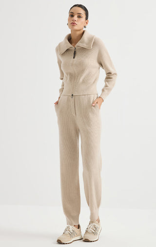 Camel wool-cashmere ribbed zip cardigan with matching pants and sneakers.