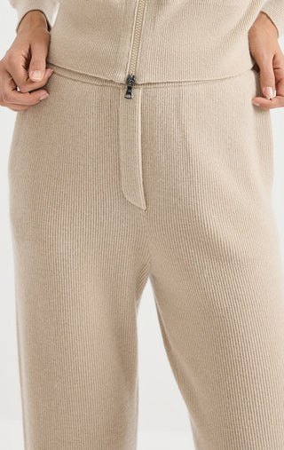 Camel ribbed knit pants with zip fly, drawstring tie, and side seam detail