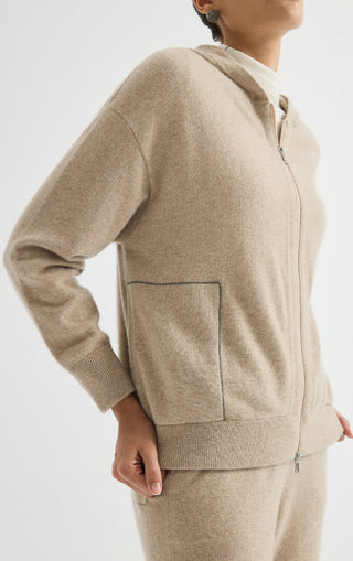 Camel cashmere zip-up hoodie side view with front pocket and zipper pull