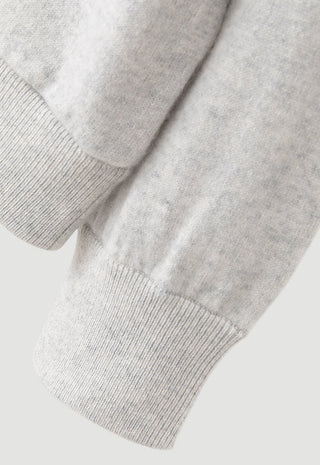 Light grey cashmere zip-up hoodie sleeve cuff with ribbed knit hem
