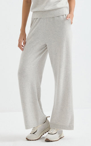 Light grey cashmere wide-leg pants with draped legs and cuffed hem