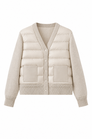 Beige down knit coat with button placket, ribbed cuffs, and quilted pocket panels