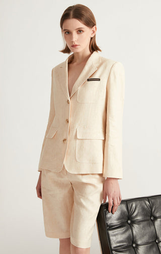 Front view tailored linen-cotton jacket with notch lapel, flap pockets, pocket label detail