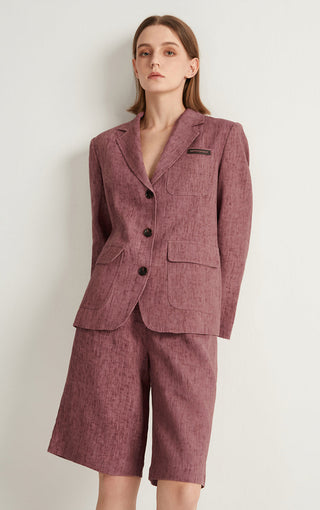 Reddish-mauve linen bermuda shorts with tailored waist, side pockets, cuffed hem