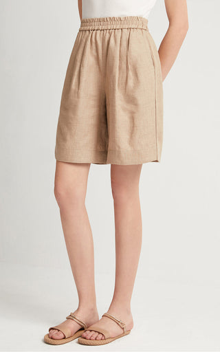Khaki linen elastic-waist tailored shorts with relaxed pleats and knee-length hem.