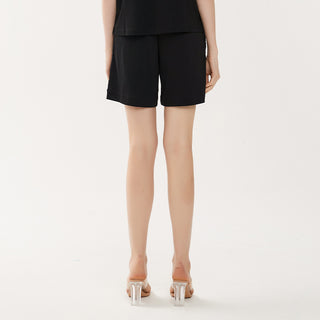 Black combed cotton shorts, straight hem with elastic waistband and beaded side detail