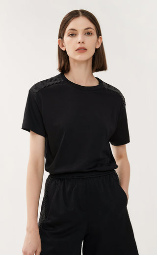 Black beaded-side cotton shorts with elastic waistband and relaxed, straight silhouette