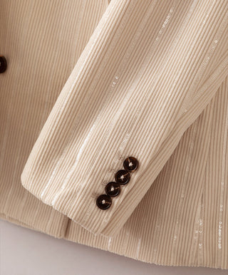 Beige pinstripe shimmer blazer sleeve with dark buttoned cuff