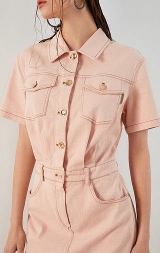 Pink denim shirt dress close-up, pointed collar, button placket and chest flap pockets
