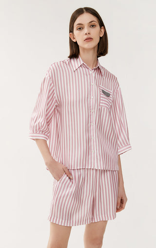 Light pink striped pocket shorts with elastic waist, relaxed fit, mid-thigh length