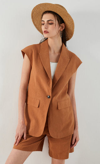 Brown sleeveless tailored vest detail view: notch lapels, patch pockets, round button