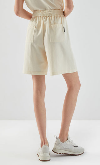 Apricot drawstring shorts with elastic waist and front patch pockets