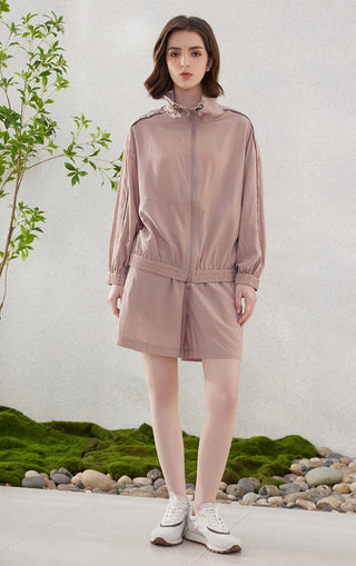 Rose-pink shorts set with elastic waistband; shows short length and relaxed leg shape.