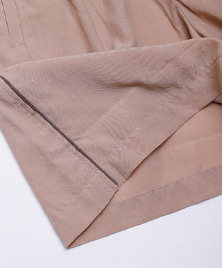 Rose Tencel shorts hem with dark beaded trim piping and side seam stitching