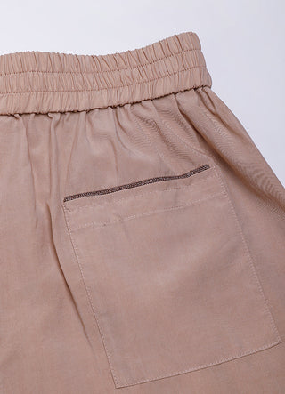 Rose Tencel shorts with elastic waist, side pocket, and beaded trim detail