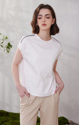 White cotton short-sleeve top, crew neck, relaxed fit, gray piping detail at shoulders