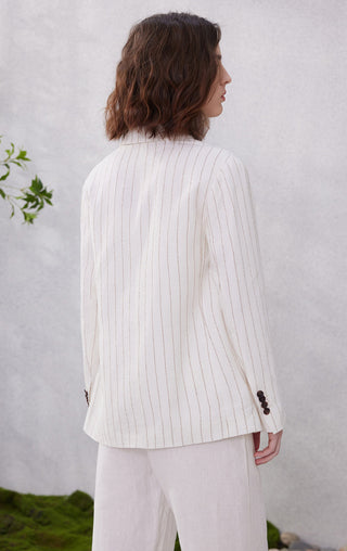 White pinstripe linen blazer back view, vertical stripes and buttoned cuffs