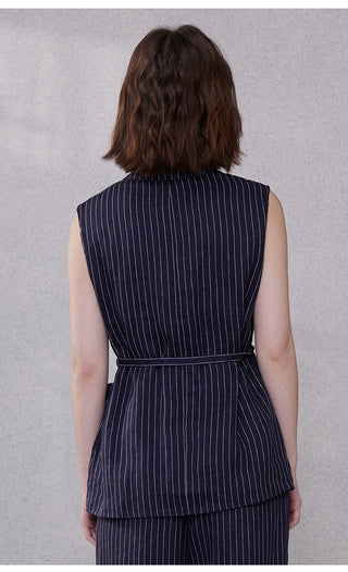 Back view of dark blue pinstripe sleeveless blazer vest with waist tie