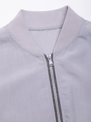 Neckline close-up of light purple hoodie with ribbed collar and double-zip hardware