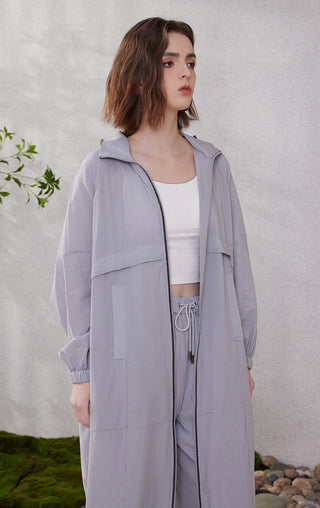 Light purple hooded zip-front coat with layered front panel and roomy pockets