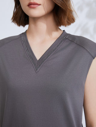 Dark gray V-neck tank top close-up with stitched neckline and cap sleeves