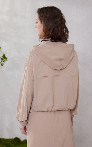 Camel hooded windbreaker jacket rear view with adjustable hood and ribbed cuffs