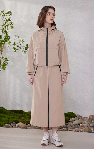 Camel hooded windbreaker jacket standing view with black zipper and contrast piping