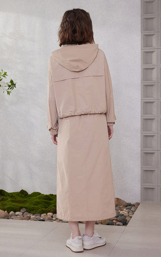 Camel hooded windbreaker jacket back view with drawstring hood and black zipper