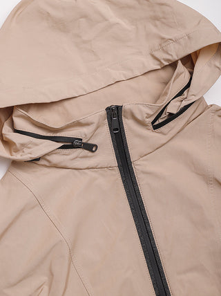Camel jacket close-up of black zipper, adjustable hood drawcord, and front pocket