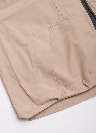 Camel hooded windbreaker jacket hem and stitching detail