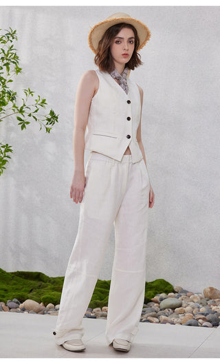 White linen tailored vest with three front buttons and welt side pockets