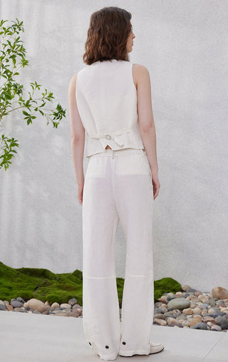 White linen tailored vest back view, sleeveless with center seams