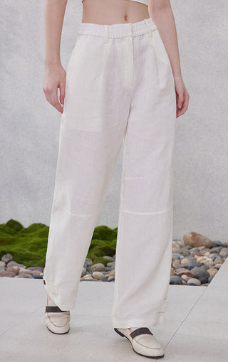 White linen relaxed straight-leg pants, relaxed fit with pleated front and ankle length