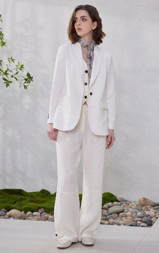 White linen relaxed straight-leg pants, loose drape with elastic waist