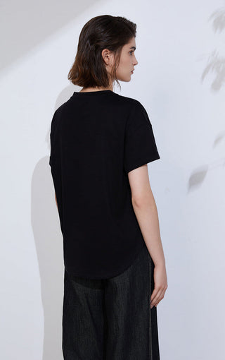 Black T-shirt shown from back, short sleeves and straight hem