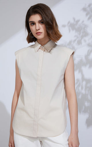 Beige sleeveless structured button-up shirt, pointed collar with front placket