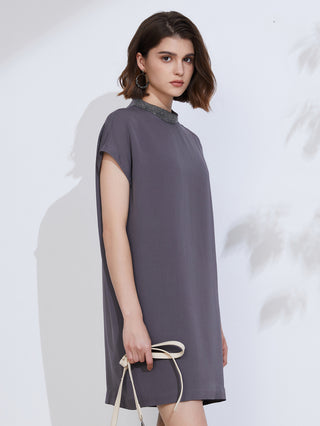 Dark gray shift dress with keyhole back opening and embroidered necklace collar