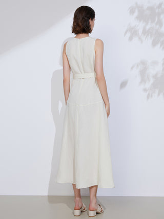 White linen belted midi dress back view with sleeveless shoulders and draped skirt