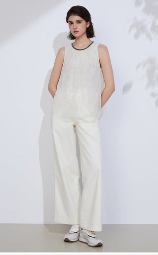 Full-length: ivory sleeveless silk-blend top with beaded neckline and floral print