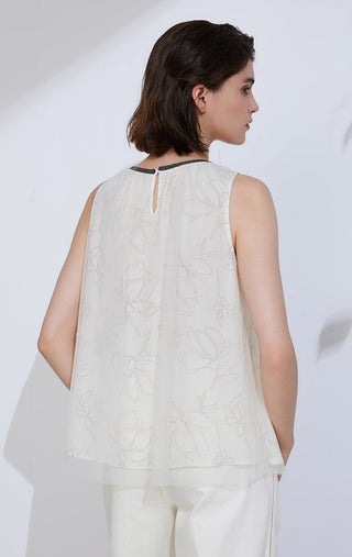 Back view: ivory sleeveless silk-blend top with beaded neckline trim and keyhole
