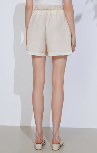 Apricot sheer-layered lightweight shorts, elastic waist and layered hem