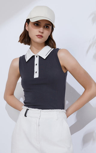 Black sleeveless polo front with white contrast collar, button placket, and straight hem