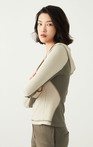 Greige zip hoodie side view, full-zip front, hood, and ribbed cuffs
