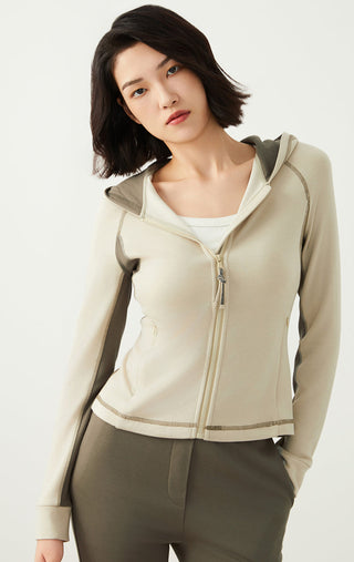 Greige zip hoodie with adjustable hood drawstrings and front zipper seam details