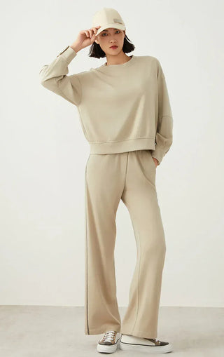 Sage green relaxed sweatshirt with long sleeves and crew neckline
