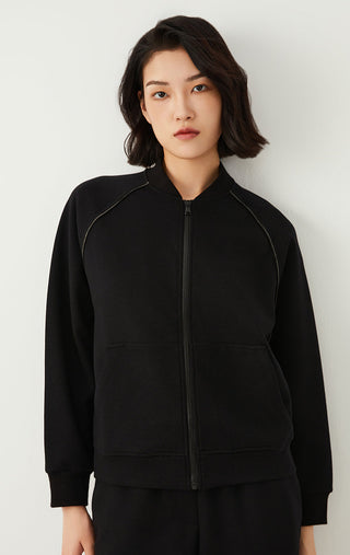 Black zip-up jacket with stand collar, front zipper, and side pockets.