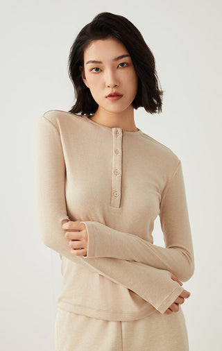 Apricot Tencel wool henley long-sleeve top, button placket and short collar.