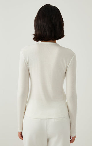 White henley long-sleeve top, back view with clean neckline and straight hem.