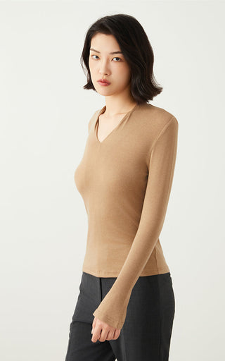 Camel V-neck long-sleeve top, side view with fitted waist and hem